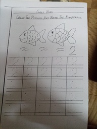 Students practiced writing number 2 in book pg-06